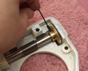 Tighten down the worm motor gear set screws