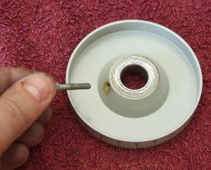 Removing the RA scale lock screw