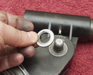 The small washer under the altitide lock lever