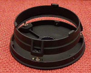 The stripped, clean and repainted mirror cell