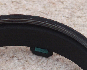 Mirror cell retaining clips and new felts