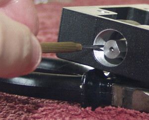 Replacing the float adjuster in the worm carrier